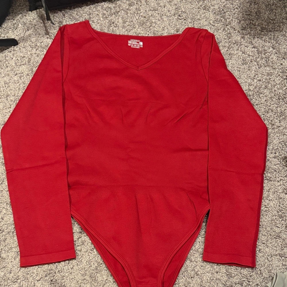 MRIGNT Red Long Sleeve Women’s bodysuit. NWOT